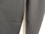a close up of a pair of black pants on a hanger