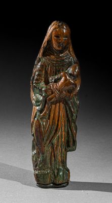 an image of a statue of a woman holding a baby
