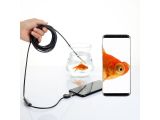a fish that is connected to a phone with a cord