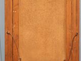 an old wooden frame with a string attached to it on a shelf