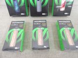 three boxes of vapors are sitting on a table with a box of vapors
