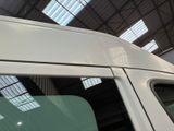 a white van that is parked in a building