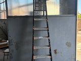 a ladder that is leaning up against a wall