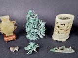 a lot of small pieces of art that are on the table