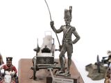 a statue of a man on a horse with a staff