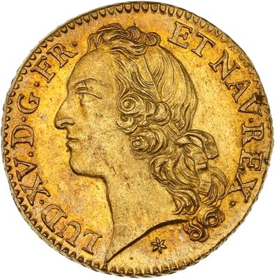 une pièce d'or représentant la tête d'une femme aux cheveux longs