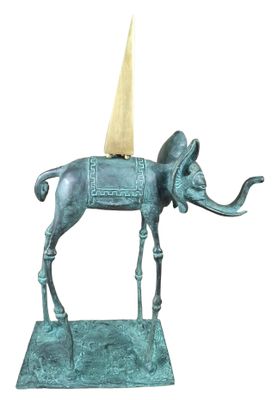 statue of an elephant with a cone on its head