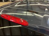 a close up of a car ' s tail light and tail light