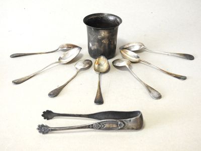 a lot of spoons and spoon spoons on the table