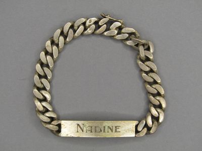 an image of a bracelet with the name naddine on it