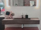 a picture of a bathroom with a sink and a mirror