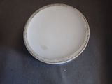 a white bowl sitting on top of a table