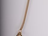 a close up of a necklace on a mannequin mannequin mannequin mannequin mannequin mannequin mannequin mannequin