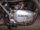 a close up of a motorcycle engine with the word yamaha on it