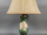 an image of a lamp with a green base and a beige shade