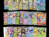 de nombreux types différents de cartes Pokémon sur fond noir