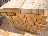 several pieces of wood stacked on top of each other in a pile