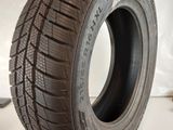 a close up of a tire on a white surface