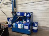 an image of a man working on a machine in a garage