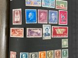 a black book with a bunch of stamps on it