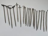several different types of swords are displayed on a white surface