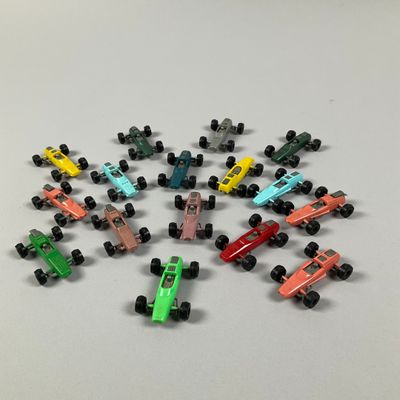 a lot of toy cars that are on a table