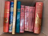 a box full of books that are sitting on a table