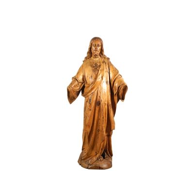 wooden statue of a man with a long beard and a robe