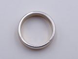 an image of a ring on a white surface