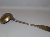 a spoon that is sitting on a table