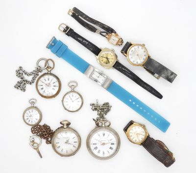 many different types of watches on a white surface