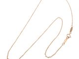 a close up of a necklace on a white background