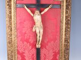 a picture of a crucifix hanging on a wall