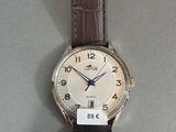 a watch that is sitting on a table with a price tag on it