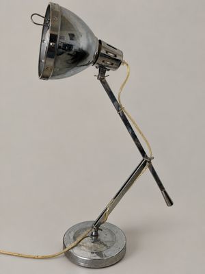 an image of a lamp that is on top of a table