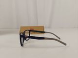 a pair of glasses sitting on top of a white surface