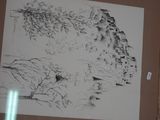 une photo d'un dessin accroché au mur d'une pièce
