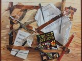 a picture of a painting of a bunch of things on a table