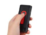 a person holding a remote control in their hand
