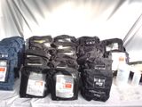 many bags of coffee on a table with a white cloth