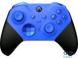 a close up of a blue controller on a white background