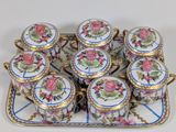 a tray with six cups and a tray with six cups on it