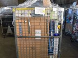 a cart with a lot of boxes on it in a warehouse
