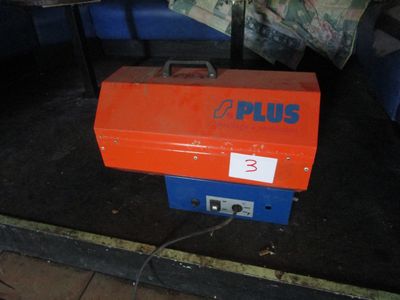 a red and blue box that is on the ground