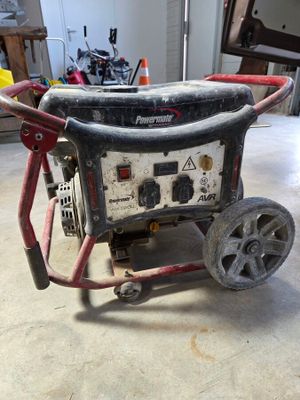 a small generator that is sitting on the floor