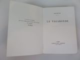 an open book on a white table with a black and white title