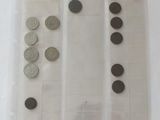 a lot of coins that are in a plastic container