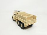 a toy truck that is sitting on a white surface