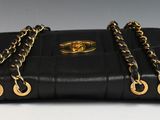 chanel black quilted leather bag with gold hardware and chain