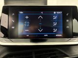 an image of a car dashboard with a touch screen